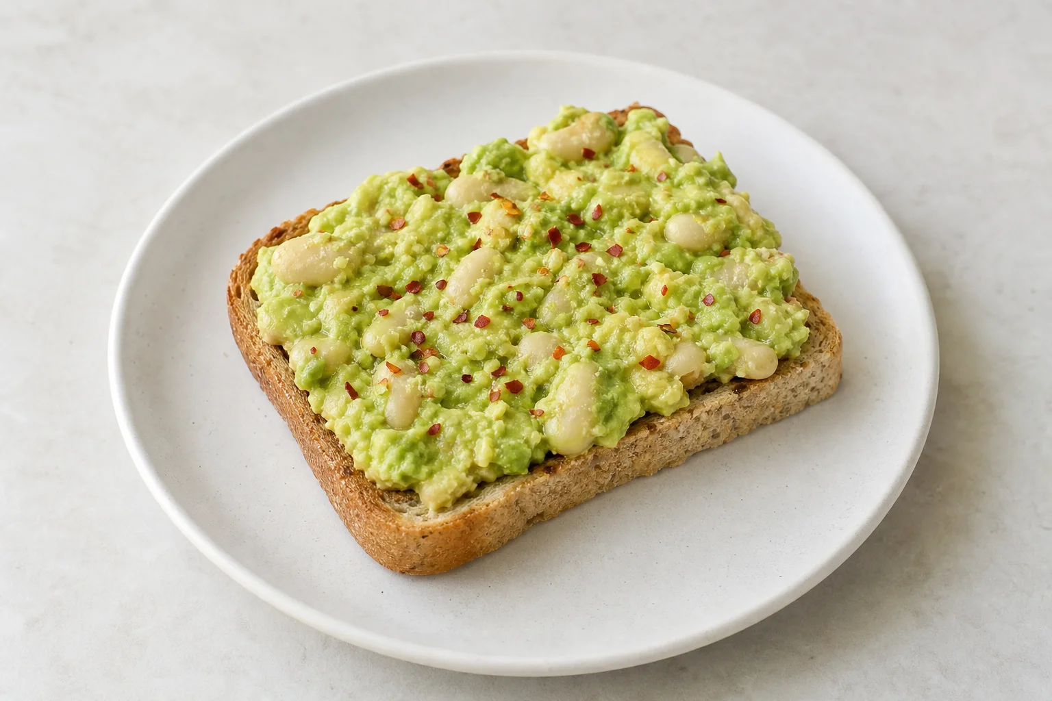 Avocado and white bean smash on gluten-free toast